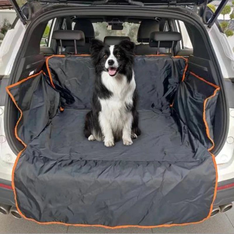 happy dog sitting on large pet cover for car